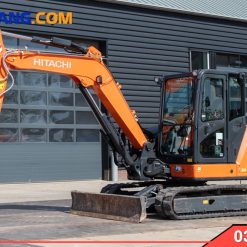Xe cuoc 03 Hitachi banh lop cao su