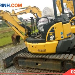 May xuc Komatsu cu