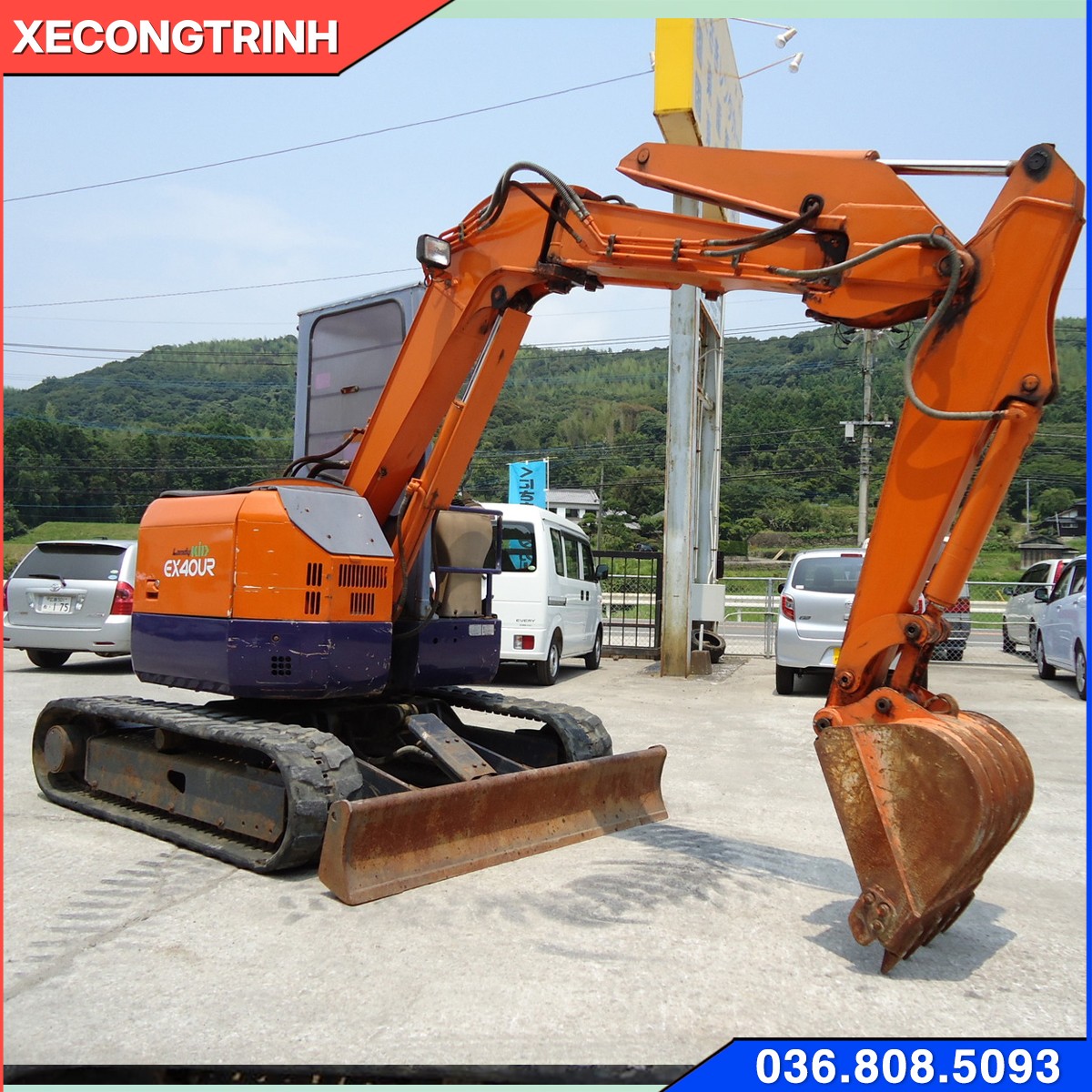 Xe cuốc Hitachi EX40 bánh xích cao su